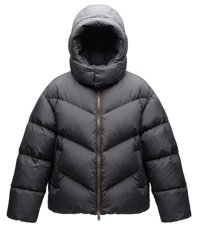 The FIRN jacket on its own, hood up, graphite with a brass zip, shown at its size-guide measurements against a faint 180 cm figure.