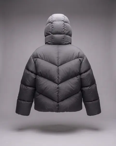 The same jacket from the back, hood up, four chevrons pointing down to a centre seam.