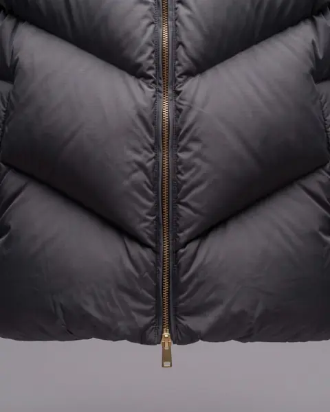 The film: a hand zips the jacket: The first frame